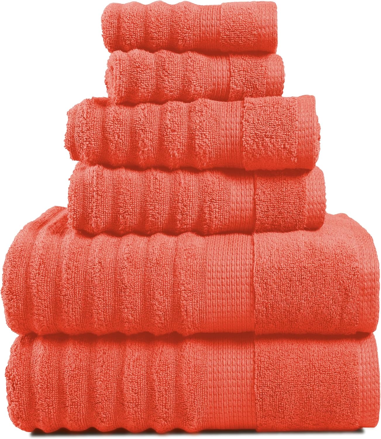 Stack of coral towels on a white background